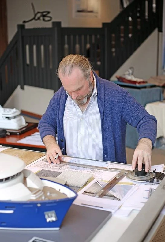 Jon working at his drawing board